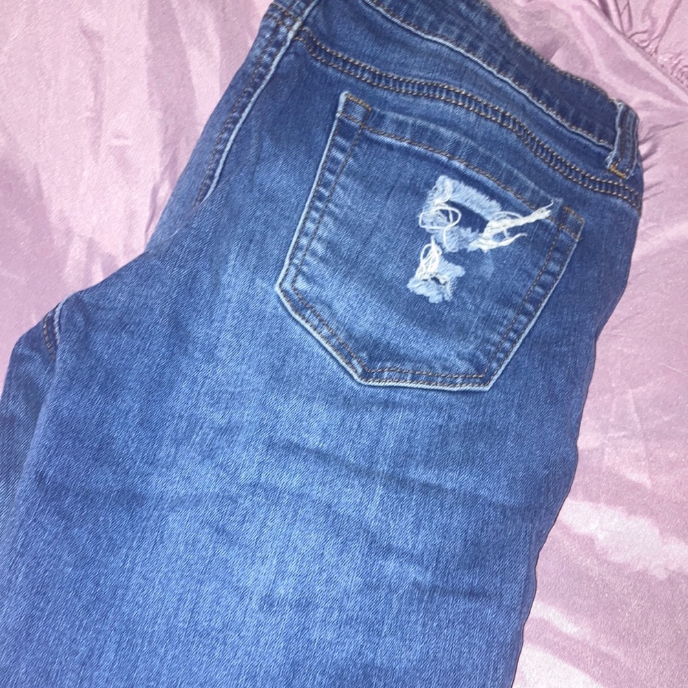 Color: medium blue ripped jeans